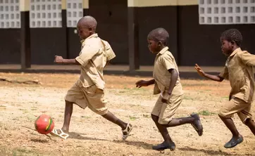 children playing football